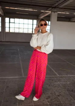 Pantalons-EASY-CLOTHES Pantalon Thaly rose avec motifs oranges | Pantalon satiné fluide | Prêt-à-porter en ligne | Easy Clothes Rose avec motifs oranges