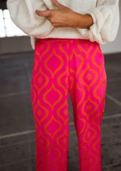 Pantalons-EASY-CLOTHES Pantalon Thaly rose avec motifs oranges | Pantalon satiné fluide | Prêt-à-porter en ligne | Easy Clothes Rose avec motifs oranges       